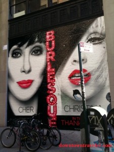 Poster advertising the movie Burlesque in NYC's Soho neighborhood.