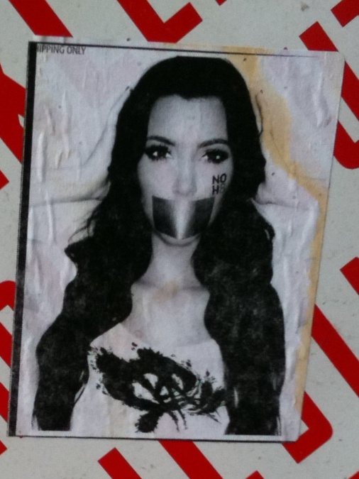 Closeup of Kim Kardashian street art in NYC's East Village