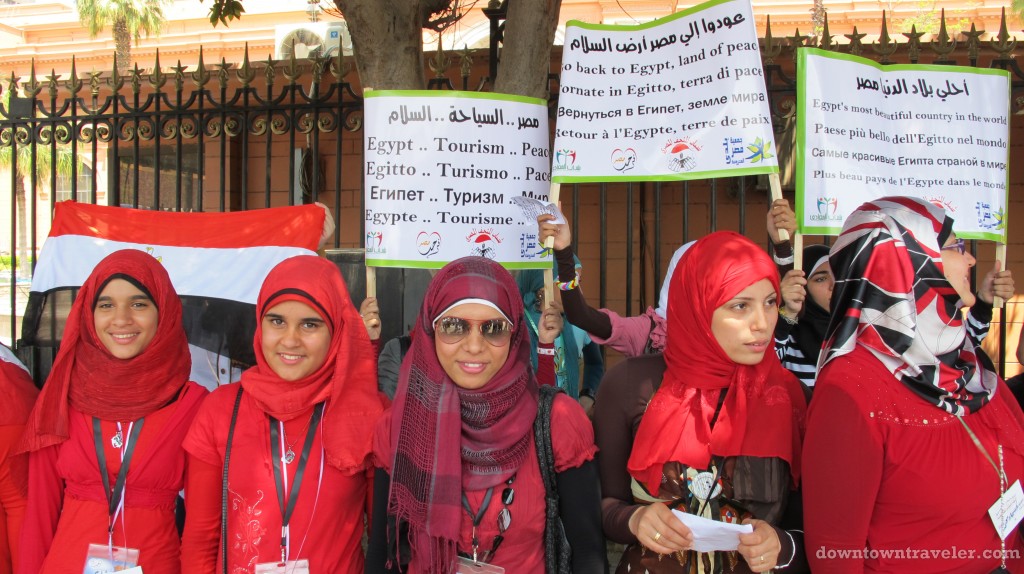 Young women in front of the Egyptian Museum in Cairo rally to promote tourism. 